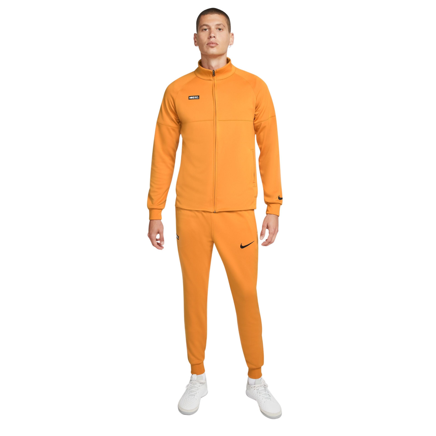 Nike tracksuit black and orange online