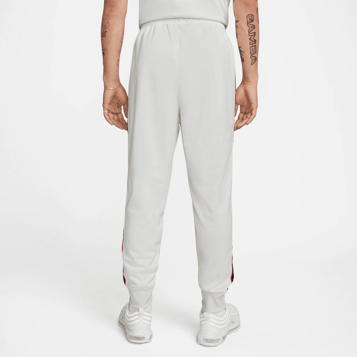 Nike repeat logo track pants outlet