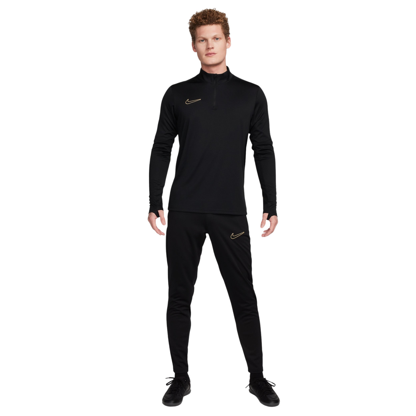 Nike tracksuit black and gold discount