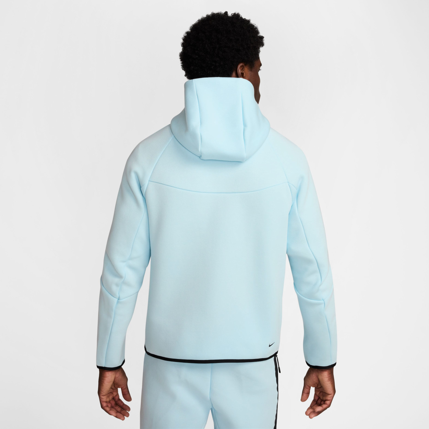 light blue nike tech suit