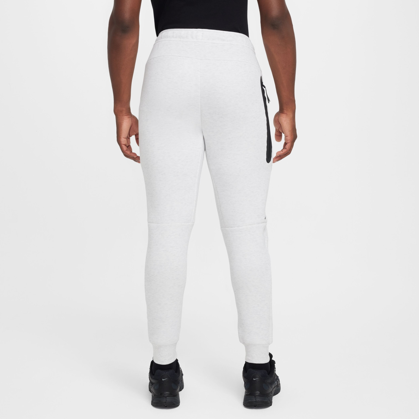 white and black nike joggers