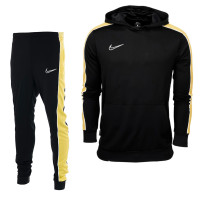 Nike black sales and gold tracksuit