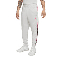 Nike performance grijs roze online