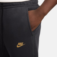 Nike Tech Fleece Joggingbroek Sportswear Nike Tech Fleece Sportswear Joggingbroek Donkergrijs Zwart Goud